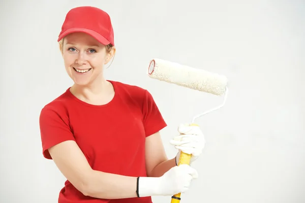 Mulher pintor trabalhador com rolo — Fotografia de Stock
