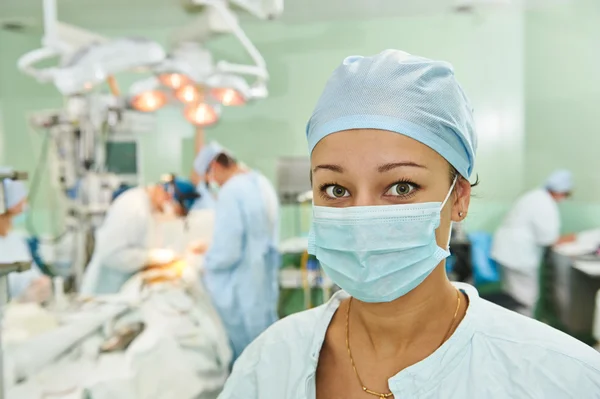 Surgeon nurse at operation — Stock Photo, Image