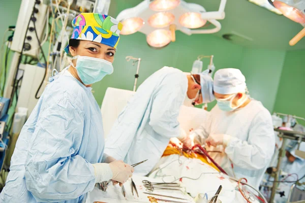 Surgeons team at operation — Stock Photo, Image