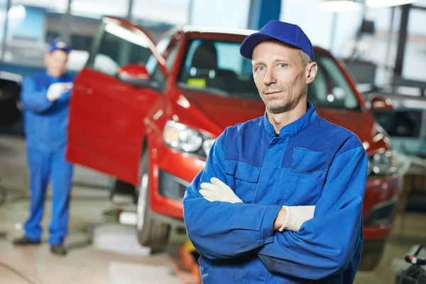 Repairman auto mechanic at workshop Stock Picture