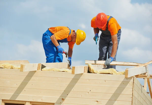 Carpenters at wooden roof work — Stock Image Carpenters at wooden roof work Stock Image