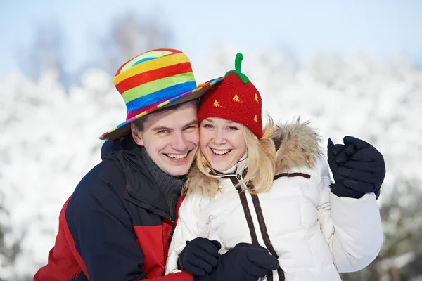 Happy family couple in winter — Stock Photo, Image