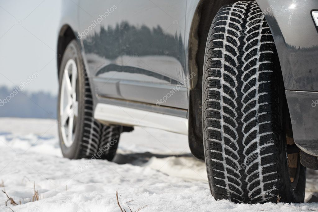 Winter tyres wheels installed on suv car outdoors — Stock Photo