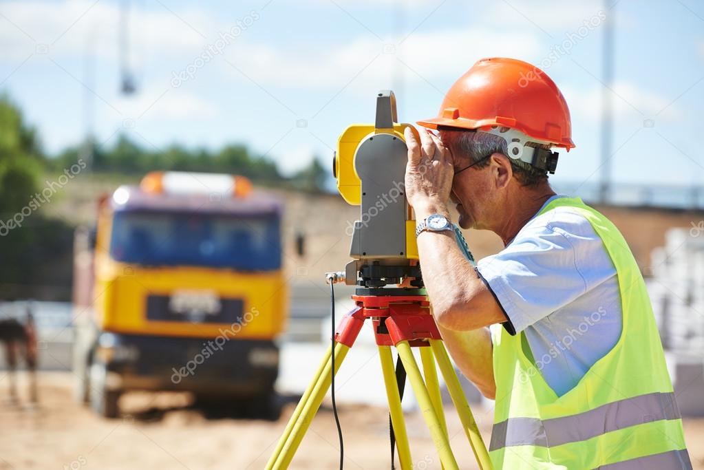 Surveyor worker with theodolite