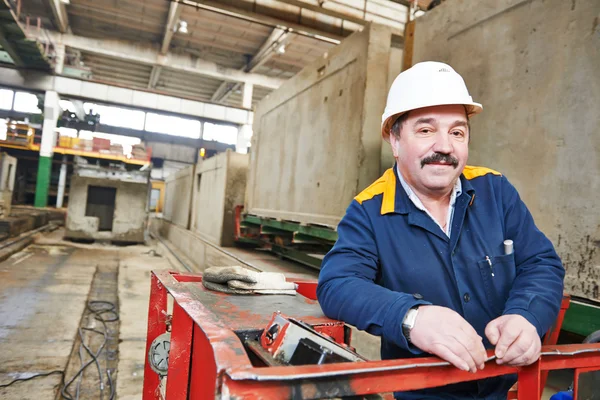 Happy industry worker at factory — Stock Photo, Image