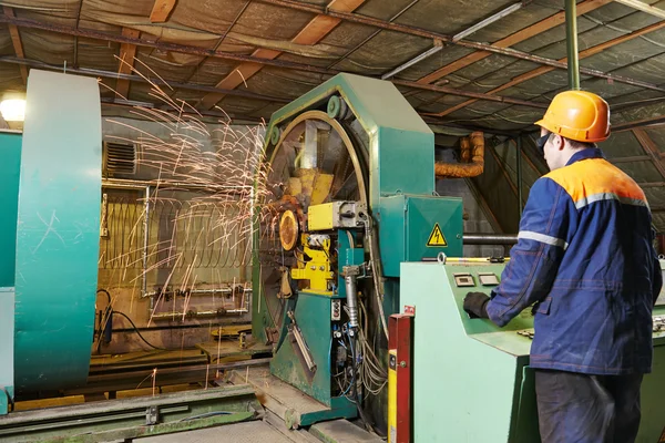 Worker making reinforcement for pipe — Stock Photo, Image