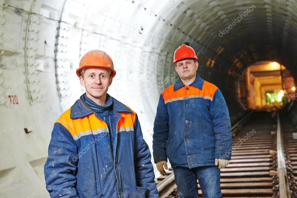Tunnel workers at underground construction site