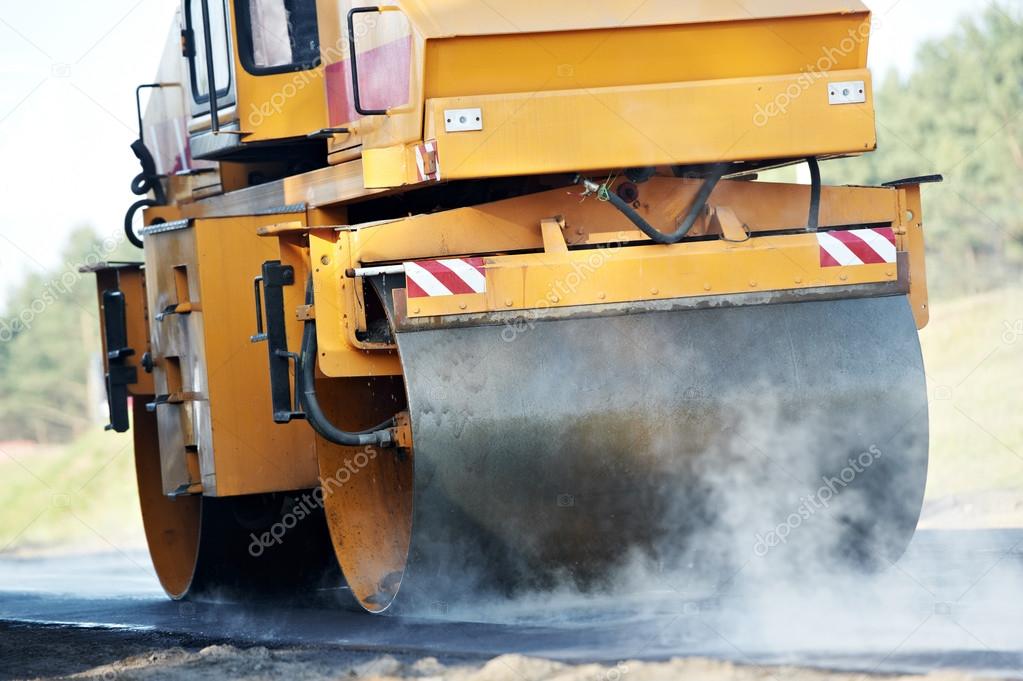 Compactor roller at asphalting work