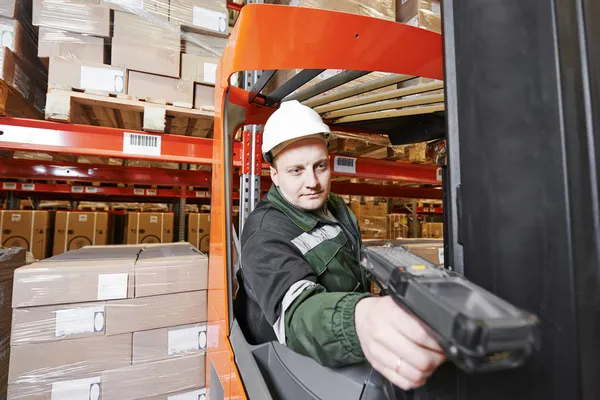 Warehouse worker with scanner — Stock Photo, Image