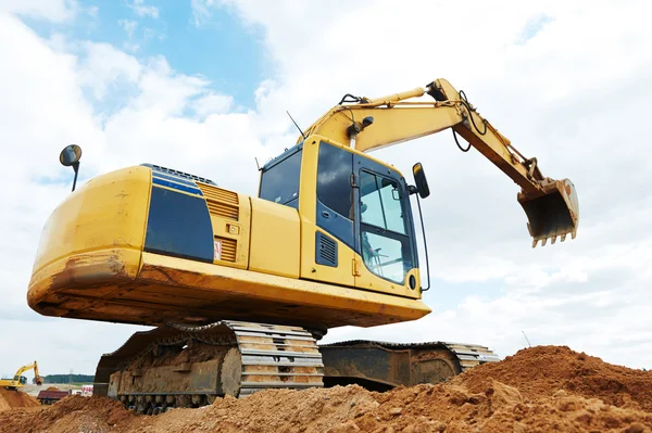 Excavator loader at earthmoving works — Stock Photo, Image