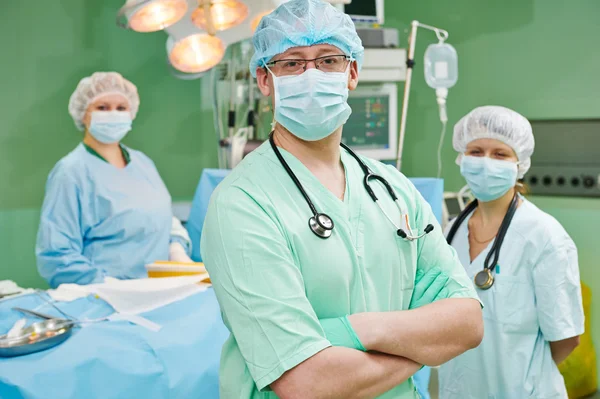 Surgeons team in surgery operation room — Stock Photo, Image