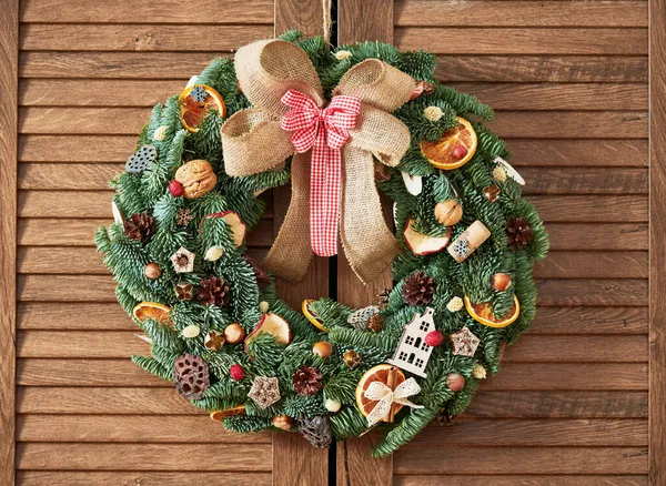 Handmade wreath from natural fir branches for decoration on and winter holidays. Christmas — Stock Photo, Image