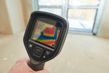thermal imaging camera inspection window for temperature check and finding heat loss clipart