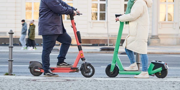 Scooter in the city. Couple meeting using ecological transport in street. — Stock Photo, Image