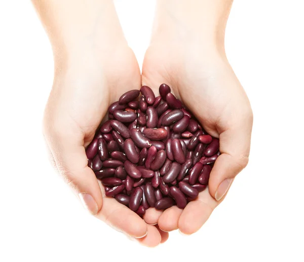 Hands with heap of beans isolated on white background — Stock Photo, Image