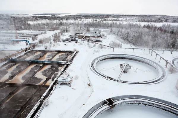 Aerial view of sewage treatment plant with evaporation in winter season — Stock Photo, Image
