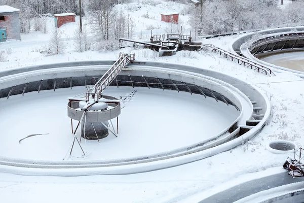 Covered with snow empty big settlers in sewerage treatment plant — Stock Photo, Image