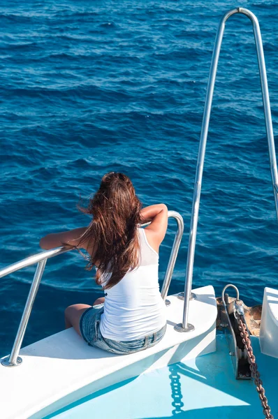 Young woman on a yacht — Stock Photo, Image