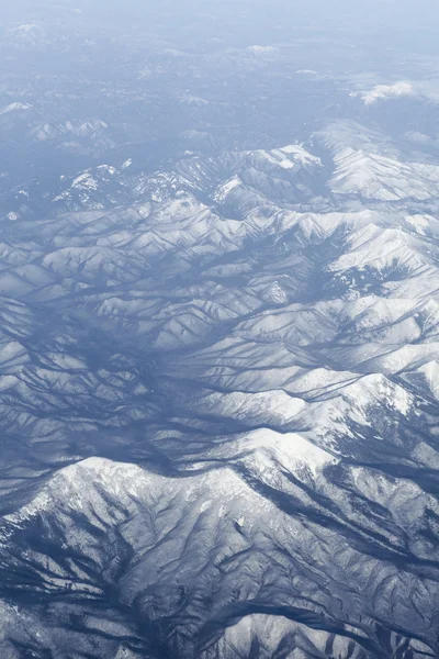 Snowcovered bergskedja, japan. Flygfoto — Stockfoto