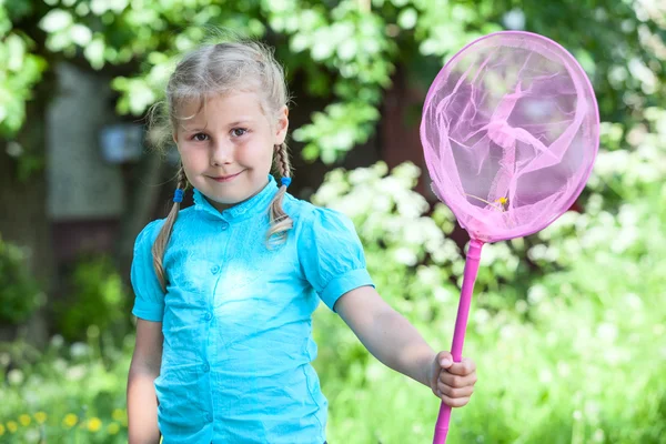 Happy child with butterfly net — Stock Photo, Image