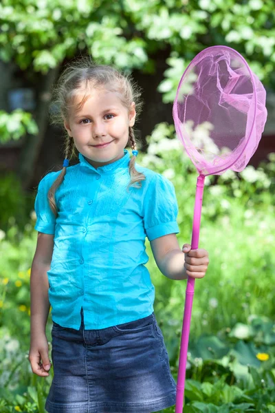 Happy child with butterfly net — Stock Photo, Image