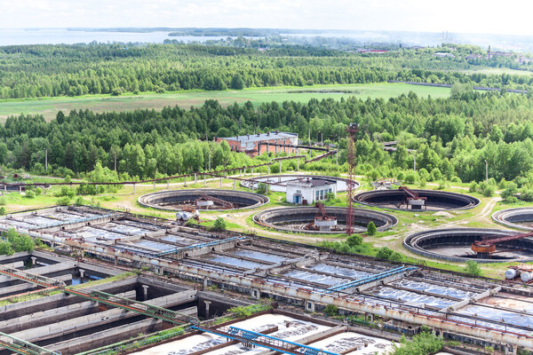 Water treatment plant area with round settlers and aeration basins