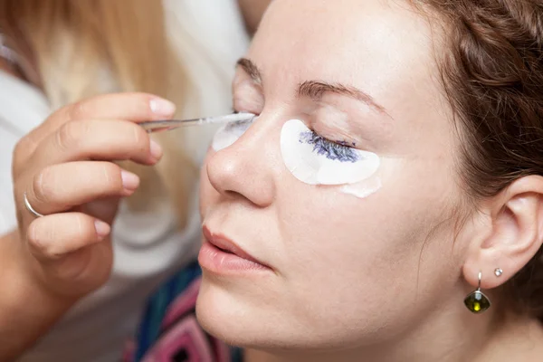 Female eyelashes painting — Stock Photo, Image