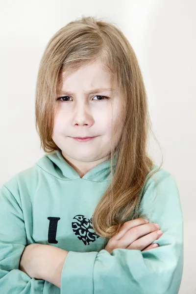 Girl with an angry look — Stock Photo, Image