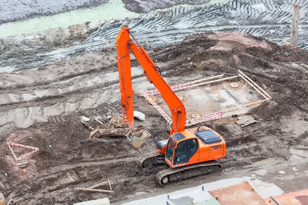 Orange excavator — Stock Photo, Image
