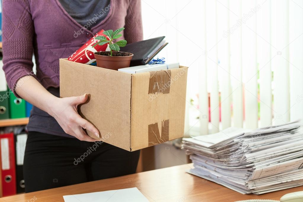 Office employee with box