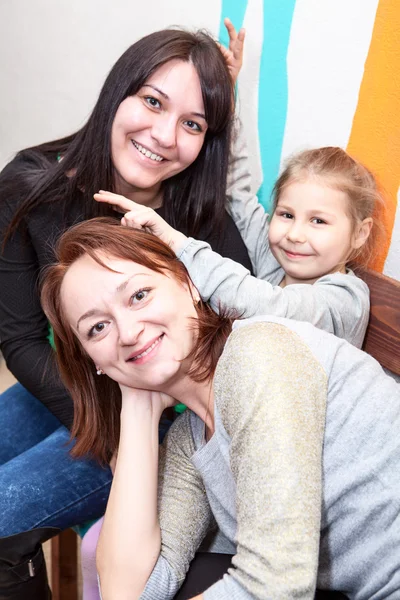 Two adult women and girl — Stock Photo, Image