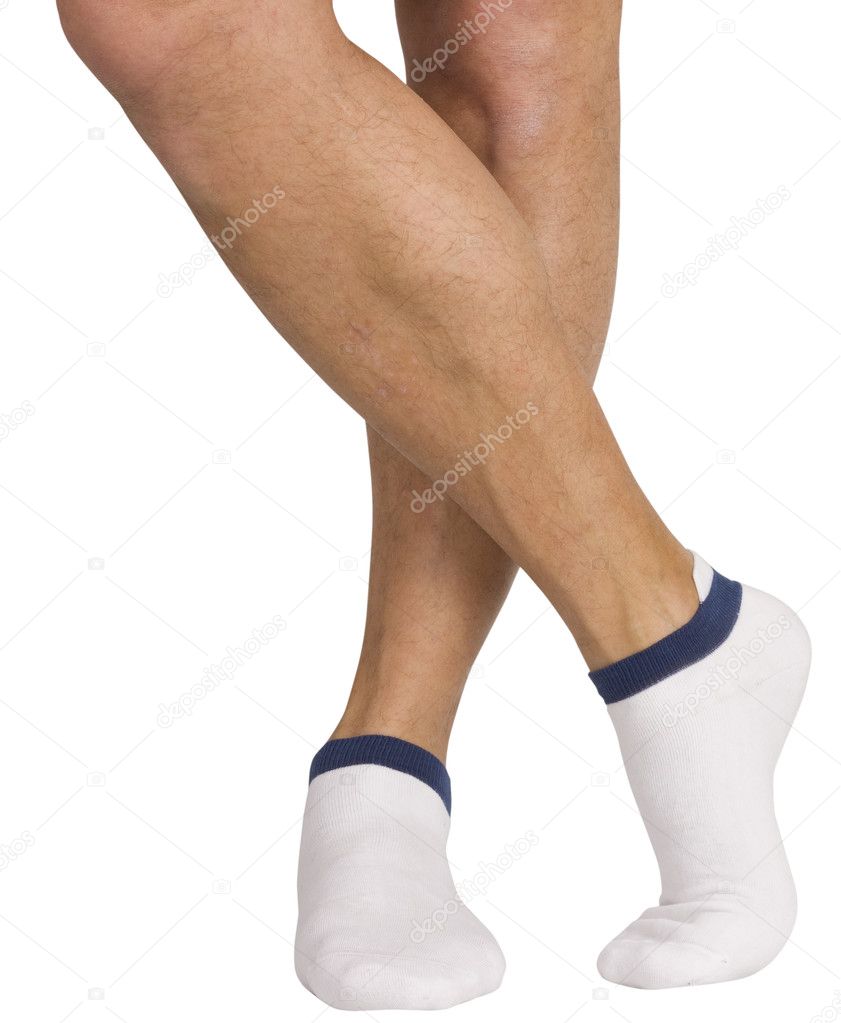 Male legs in socks. Isolated on white background