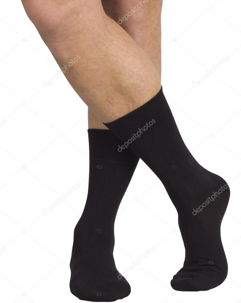 Male legs in socks. Isolated on white background