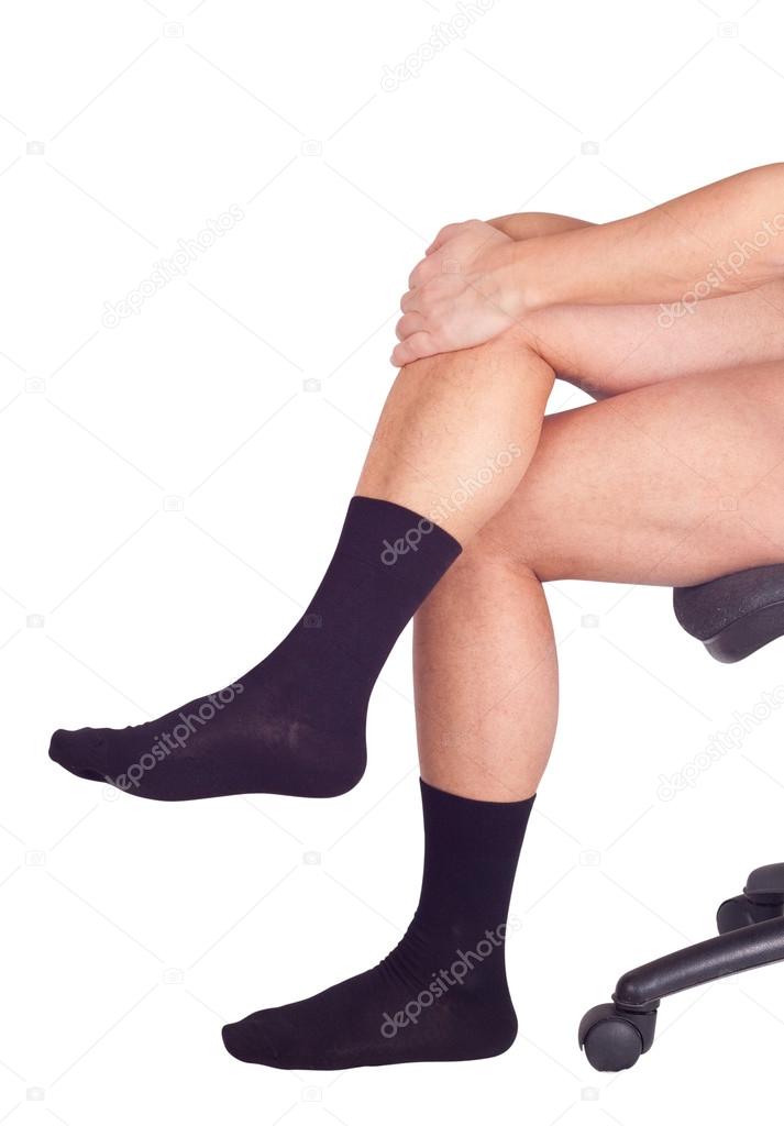 Male legs in black socks. Isolated on white