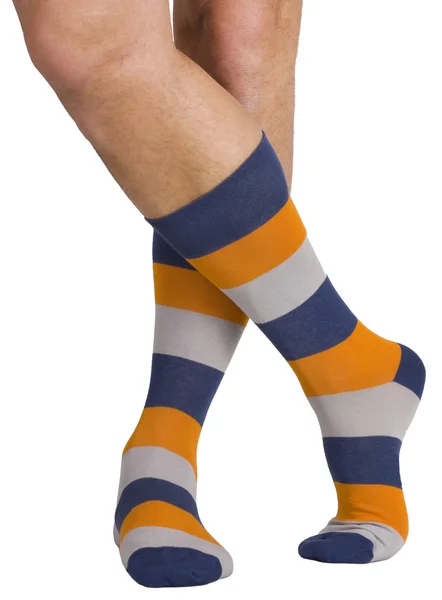 Männerbeine in Socken. isoliert auf weiß — Stockfoto