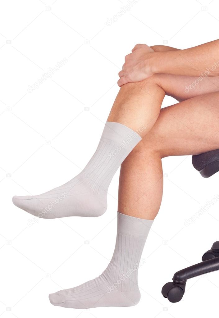 Male legs in socks. Isolated on white