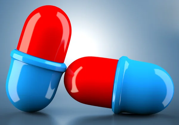 Comprimidos azul-vermelhos — Fotografia de Stock