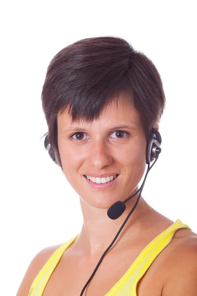 Vrolijke receptioniste met headset — Stockfoto