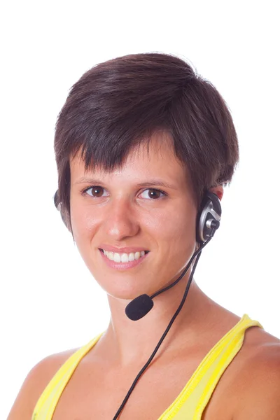 Vrolijke receptioniste met headset — Stockfoto