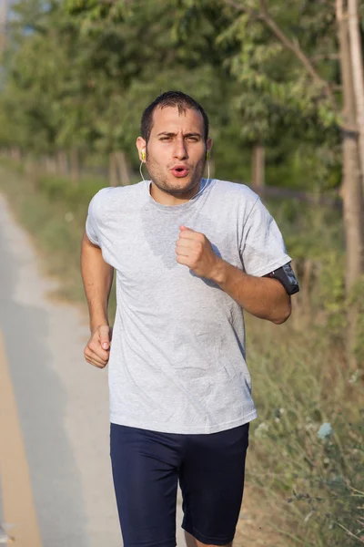 Giovane uomo Jogging — Foto Stock