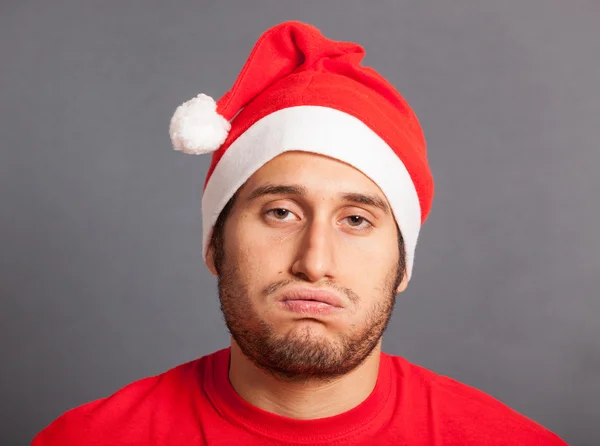 Joven con sombrero de Santa —  Fotos de Stock