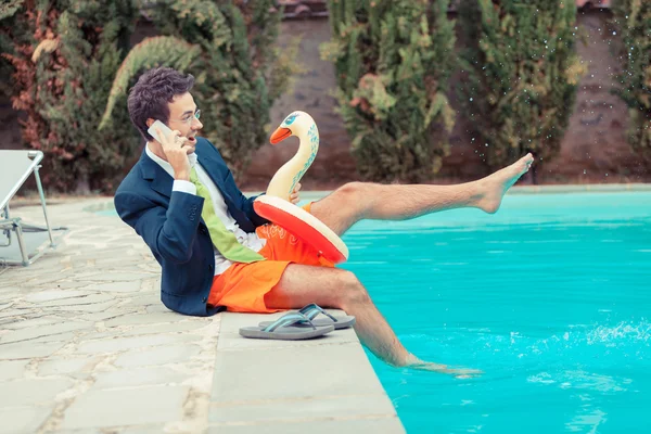 Funny Young Businessman with SwimmingTrunks next to the Pool — Stock Photo, Image