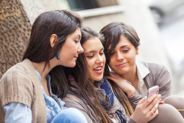 Group of Women Sending Message with Mobile Phone Stock Picture