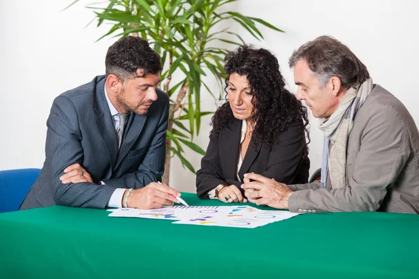 Mature Couple with Financial Consultant — Stock Photo, Image