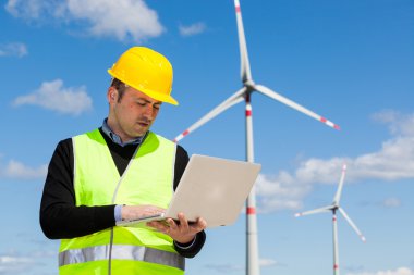 Technician Engineer in Wind Turbine Power Generator Station clipart