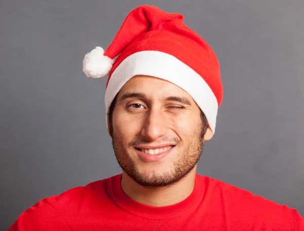 Mladý muž s santa hat — Stock fotografie