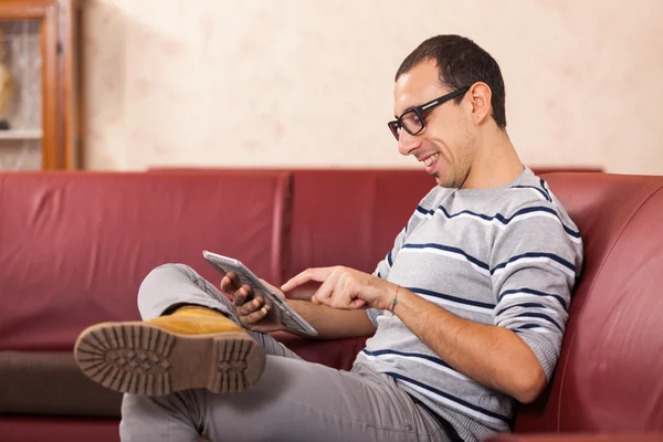 Young Man with Tablet PC at Hotel — Stock Photo, Image