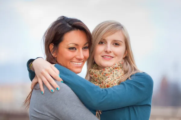 Spanish and Polish Women Embraced — Stock Photo, Image