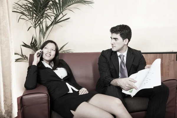 Young Business Couple on the Sofa — Stock Photo, Image