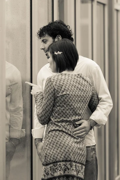 Romantic Young Couple Looking Out the Window — Stock Photo, Image